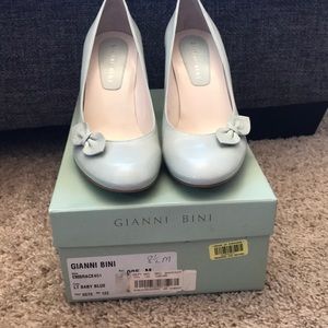 Never worn pumps.  Gianni Bini.